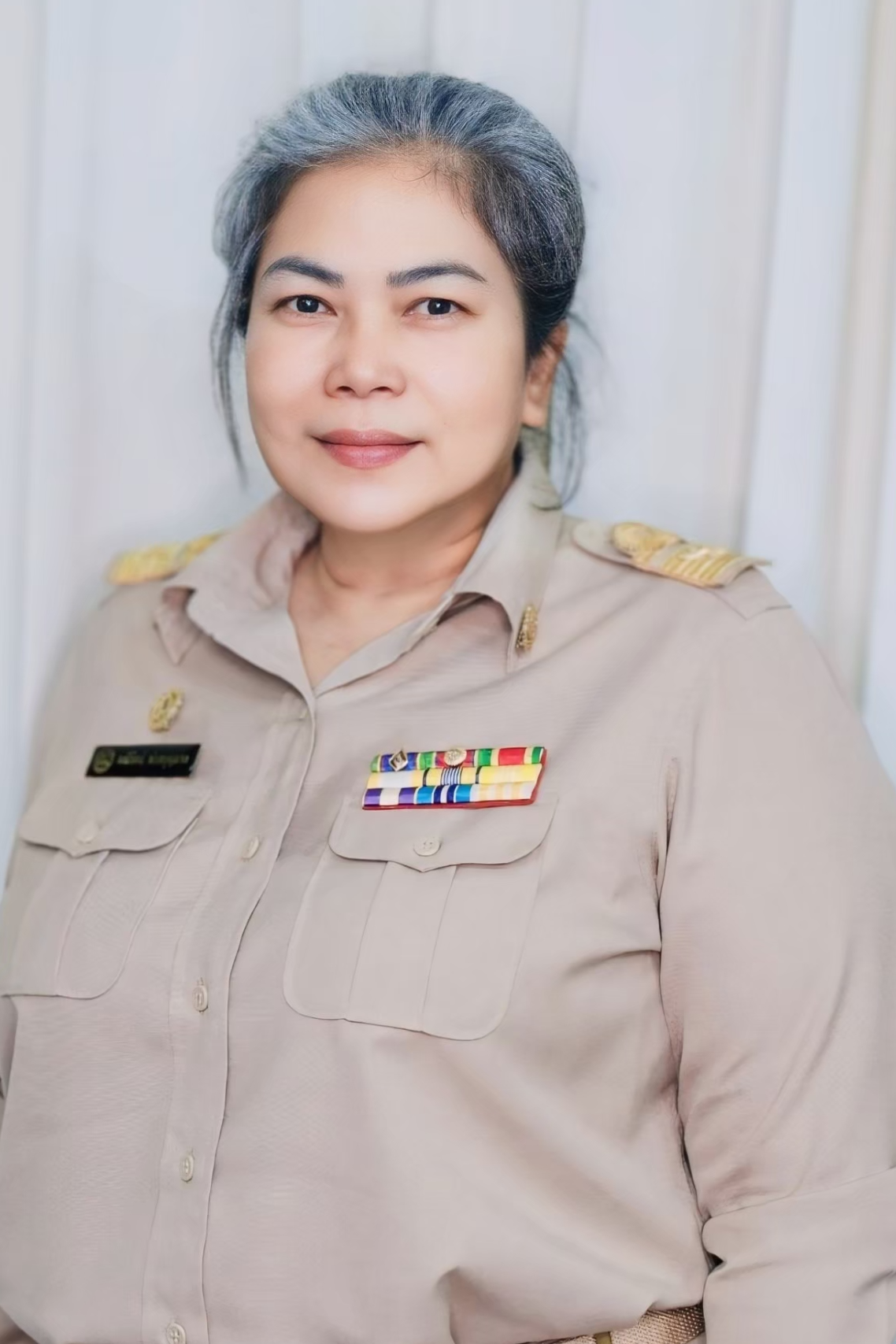 นางมณีรัตน์ พ่วงบุญมาก