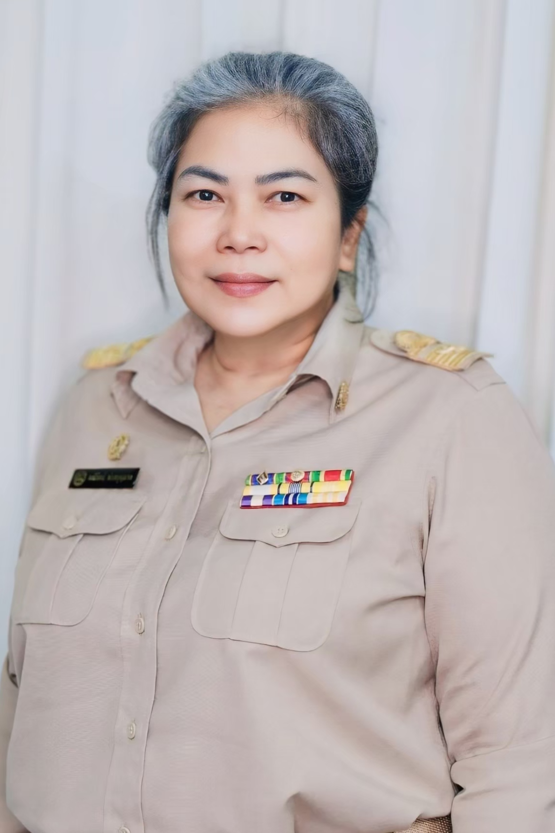 นางมณีรัตน์ พ่วงบุญมาก